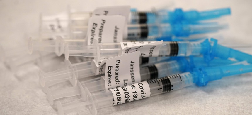 Syringes loaded with shots of Johnson & Johnson COVID-19 vaccine in the pharmacy of National Jewish Hospital for distribution early Saturday, March 6, 2021, in east Denver. 