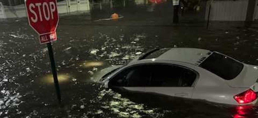 A car that was underwater in Jamaica due to the severe flooding on Wednesday.