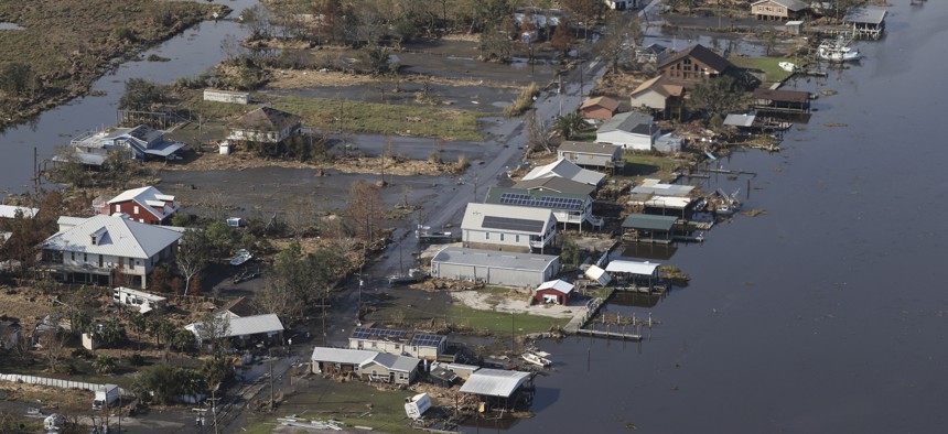 A view of flood damaged buildings are seen as President Joe Biden (not pictured) inspects the damage from Hurricane Ida on the Marine One helicopter during an aerial tour of communities in Laffite, Grand Isle, Port Fourchon and Lafourche Parish, Louisiana, Friday, Sept. 3, 2021.