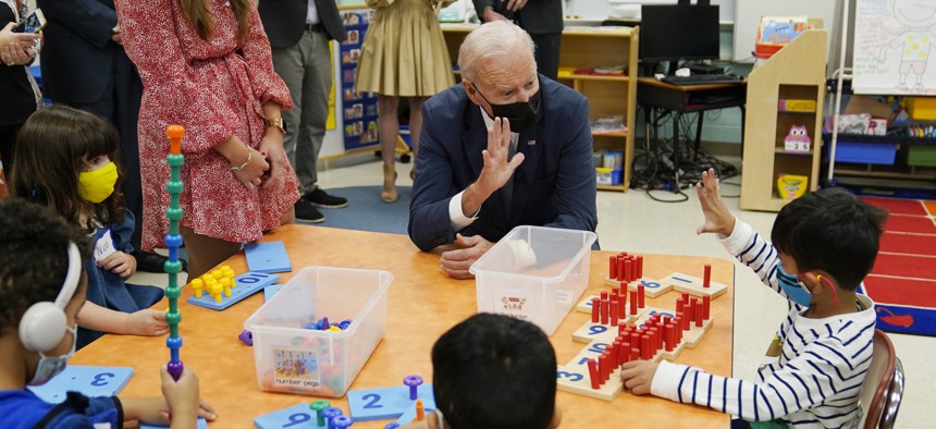 President Joe Biden talks to students during a visit to East End Elementary School to promote his "Build Back Better" agenda, Monday, Oct. 25, 2021, in North Plainfield, N.J. 