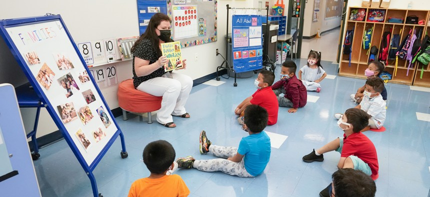 In this Sept. 16, 2021, file photo Pre-K teacher Vera Csizmadia teaches 3-and 4-year-old students in her classroom at the Dr. Charles Smith Early Childhood Center in Palisades Park, N.J.