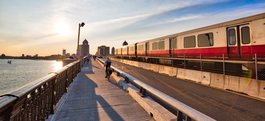 A Massachusetts Bay Transportation Authority train crosses a bridge over the Charles River in Boston.