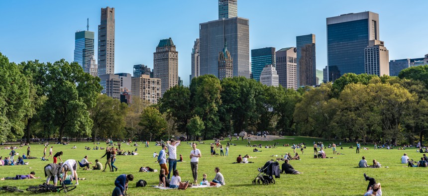 View of Sheep Meadow in Central Park and the midtown Manhattan city skyline on October 12, 2019 in New York