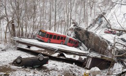 PITTSBURGH, PA Vehicles including a Port Authority bus are left stranded after a bridge collapsed along Forbes Avenue on January 28, 2022 in Pittsburgh, Pennsylvania. At least 10 people were reportedly injured in the early-morning collapse, hours ahead of a scheduled visit by President Joe Biden to promote his infrastructure plan. 