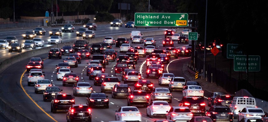Motor vehicles drive on the 101 freeway in Los Angeles.