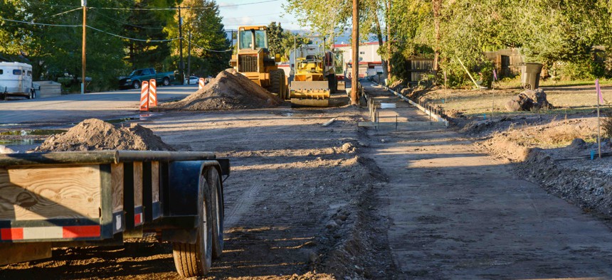 A sidewalk being constructed in a rural town in Utah.