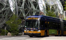 A King County Metro bus for essential trips only passes by The Spheres at the Amazon campus on April 30, 2020 in Seattle.