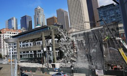 Demoliton crews work on the last remaining section of the Alaskan Way Viaduct, in September 2019.
