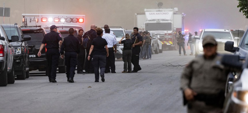 Law enforcement work the scene after a mass shooting at Robb Elementary School on May 24, 2022 in Uvalde, Texas. 
