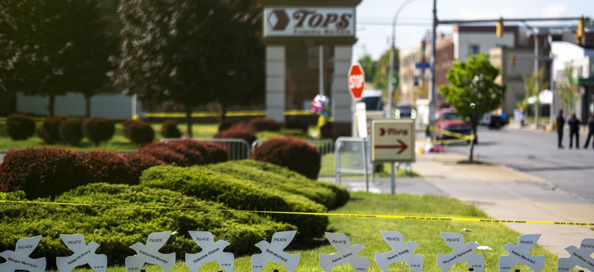 A memorial for the victims of the mass-shooting at Tops supermarket.