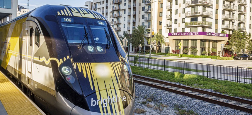 Brightline, passenger train engine on platform in West Palm Beach, Florida.