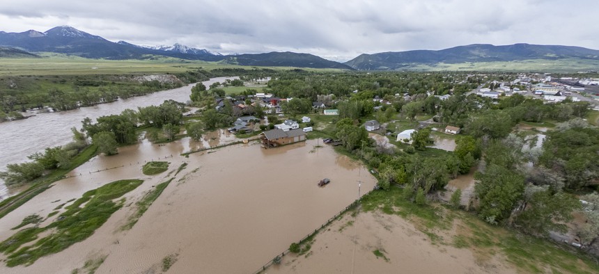 In this aerial view, flooding is seen on June 14, 2022 in Livingston, Montana. The Yellowstone River hit has a historic high flow from rain and snow melt from the mountains in and around Yellowstone National Park. 