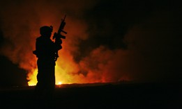 When a burn pit fire got out of control in May 2007 at Camp Fallujah, Sgt. Robert B. Brown of Regimental Combat Team 6's Combat Camera Unit documented the civilian firefighters tackling the blaze.