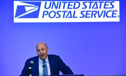 When Louis DeJoy first took office, the postmaster general led an effort to slash tens of thousands of non-union jobs by offering early retirement incentives and layoffs as part of a reorganization of its management structure.