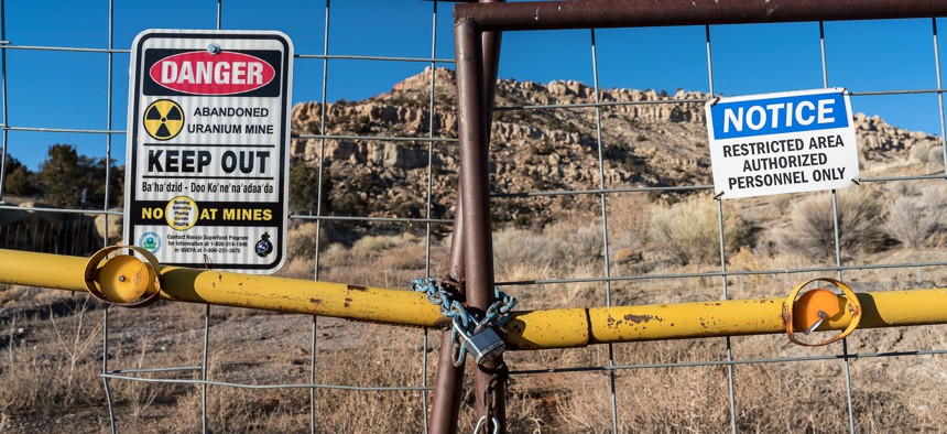 Signs warning of health risks are posted outside the gates of abandoned uranium mine in the community of Red Water Pond on Monday, Jan. 13th, 2020.