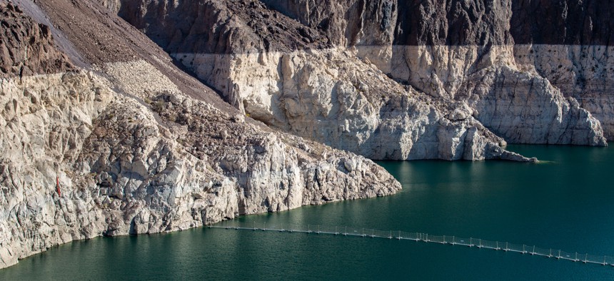 Lake Mead, the country's largest man-made reservoir that was formed by the Hoover Dam on the Colorado River in Nevada, had dropped 2 inches every day since February as of July 12. The white line shows were the water usually reaches.