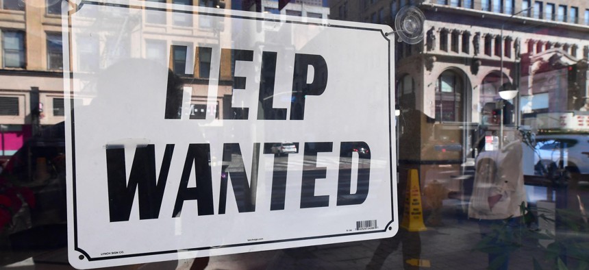 A 'help wanted' sign is posted in front of restaurant on February 4, 2022 in Los Angeles, California.