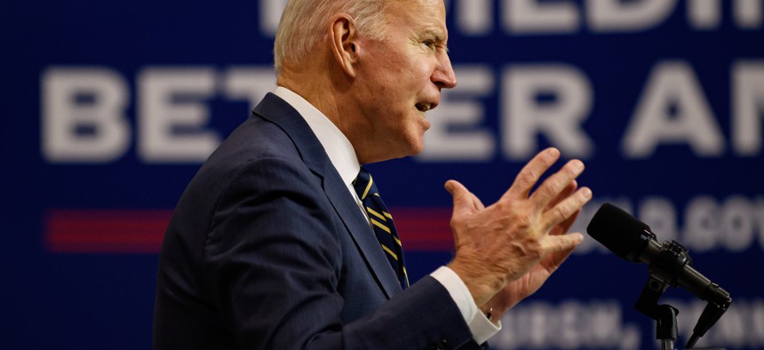 President Joe Biden speaks at Mill 19, a former steel mill being developed into a robotics research facility, on the campus of Carnegie Mellon University on January 28, 2022 in Pittsburgh, Pennsylvania. 