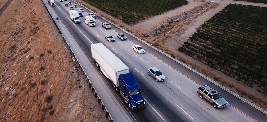 Vehicles on Interstate 5 as they transit through the Tejon Pass from the Grapevine in Kern County, California.
