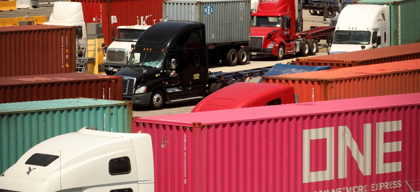 Trucks line up to load and unload at the Port of Los Angeles in Long Beach, California.