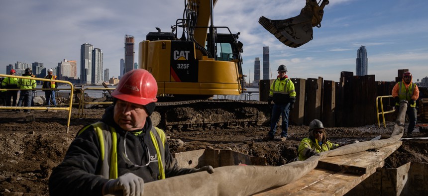 Contruction workers at the site of a flood defense project on the east side of Manhattan, New York city, on December 11, 2021.