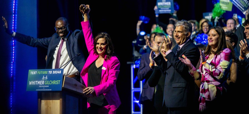 (L-R) Lt. Gov. Garlin Gilchrist II and Gov. Gretchen Whitmer celebrate during an election night watch party at MotorCity Casino Hotel on November 09, 2022 in Detroit, Michigan. Gov. Whitmer won her race over Republican challenger Tudor Dixon.