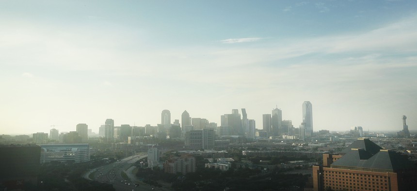 The sun rises over Dallas in 2016.