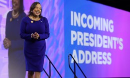 Tacoma, Wash. Mayor Victoria Woodards on stage at the National League of Cities' City Summit in Kansas City, Missouri, on Nov. 19, 2022. Woodards was elected the group's president during the event.