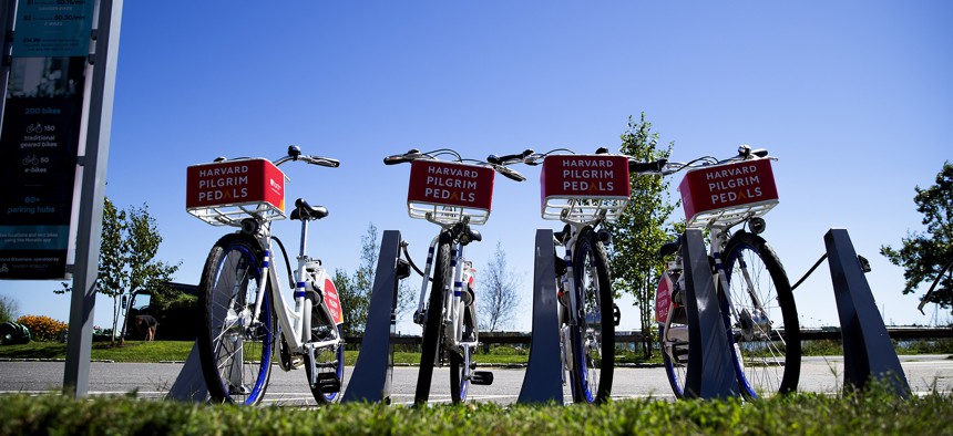 Shared bikes are parked at a station in Portland, Maine.