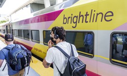 Passengers board a Brightline train in West Palm Beach, Florida.