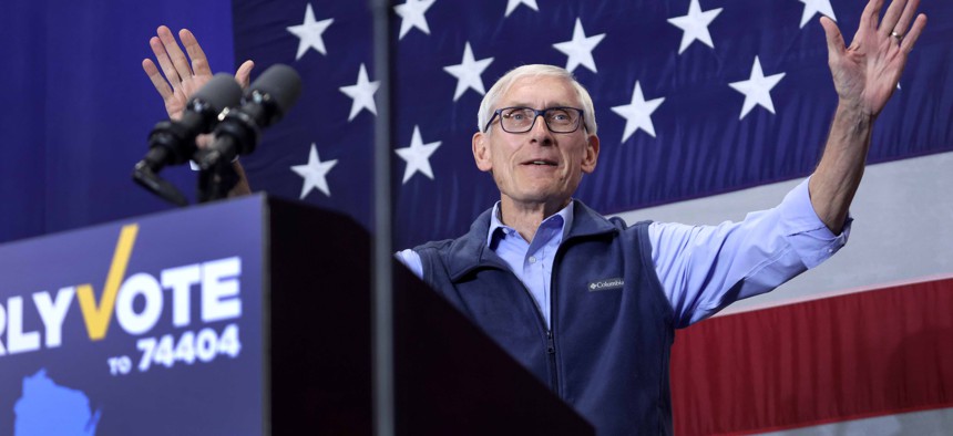 Wisconsin Gov. Tony Evers, seen here on the campaign trail last year, wants to send more state dollars to local governments.