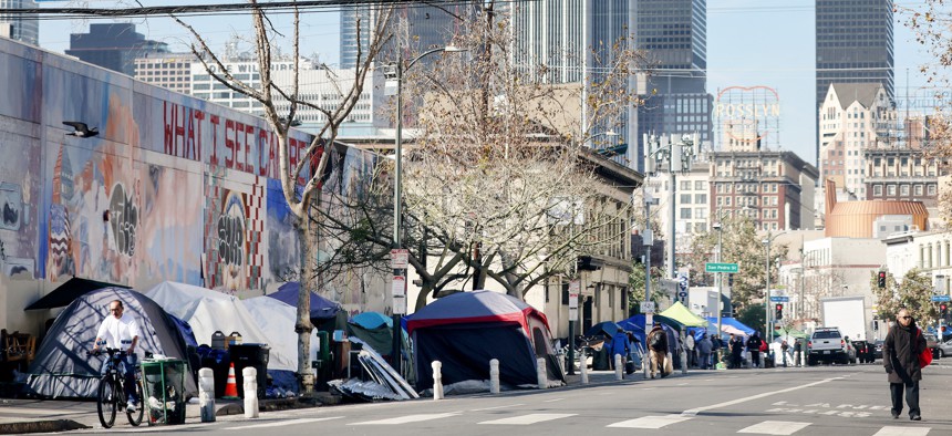 A homeless encampment lines a street in Skid Row on December 14, 2022 in Los Angeles, California. 