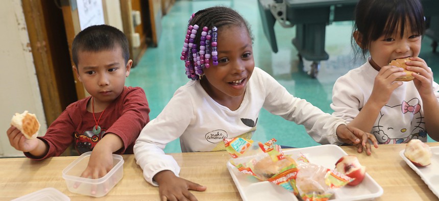 Kindergarten students eat lunch in Oakland in 2018.