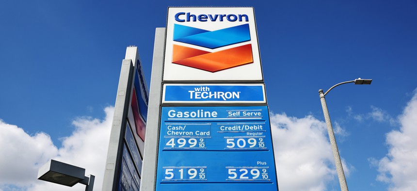 Gas prices are displayed at a Chevron gas station on February 13, 2023 in Los Angeles, California.