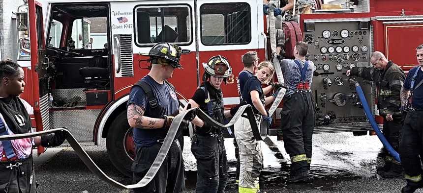 Prospective first responders and community members learn about emergency services, how volunteer organizations operate, and why they are essential to communities during a recruitment event in 2021 at the Suffolk County Fire Academy in Yaphank, New York.