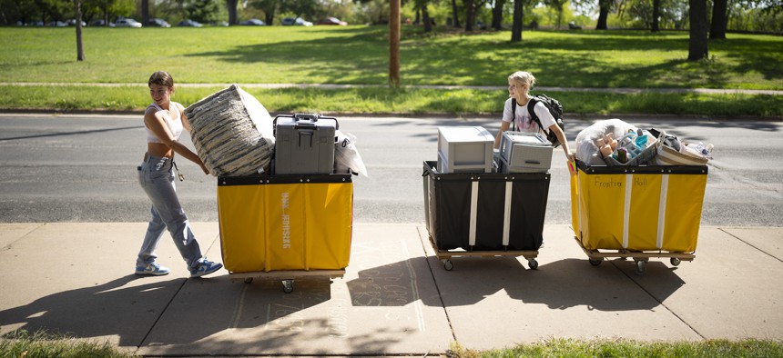 Students move into their dorms on the University of Minnesota Minneapolis campus last year. 