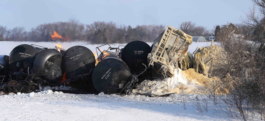 A BNSF train carrying ethanol and corn syrup derailed and caught fire in the west-central Minnesota town of Raymond, forcing residents near the scene to evacuate in the middle of the night.