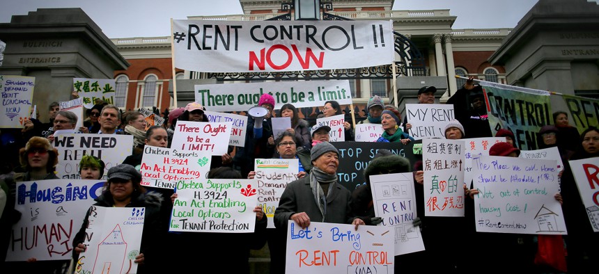Renters' rights groups rally outside the Massachusetts State House in Boston in 2020.