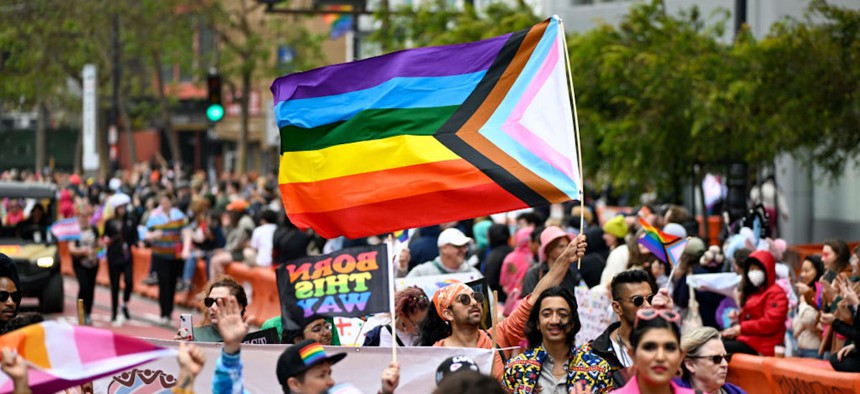 Marchers wave the Pride flag during the 53rd Annual San Francisco Pride Parade and Celebration on June 25, 2023 in San Francisco, California.