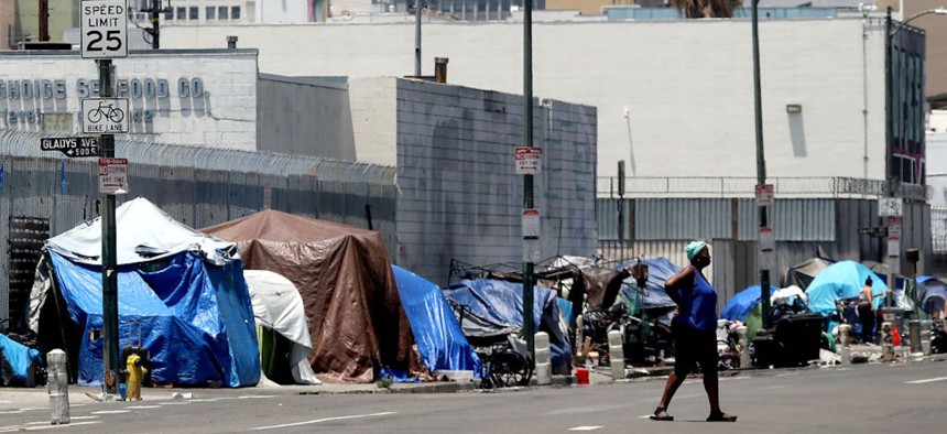 Tents that shelter homeless people line the sidewalk along Fifth Street in downtown Los Angeles on June 29, 2023. The homelessness population continued to rise dramatically in the last year, increasing by 9% in Los Angeles County and 10% in the city of Los Angeles. 