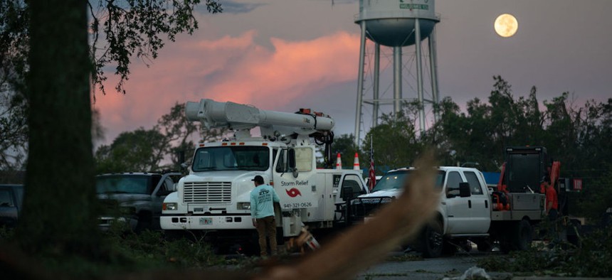 Storm relief crews prepare for a day's work in the aftermath of Hurricane Idalia on Aug. 31, 2023, in Perry, Florida