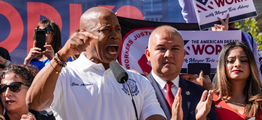 New York City Mayor Eric Adams hosts rally in August calling for expedited work authorization for asylum seekers.