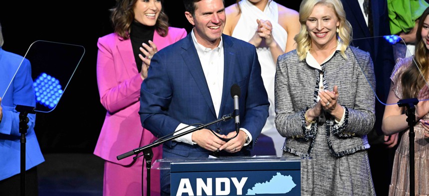 Kentucky Gov. Andy Beshear celebrates his reelection Tuesday night.