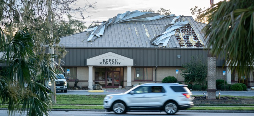 A building  in Perry, Florida, with roof damage after Hurricane Idalia crossed the state on Aug. 30, 2023.
