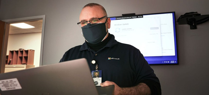 Heath Liebman, network and systems administrator for the Town of East Hampton Department of Information Technology, is shown in his office in East Hampton, New York, on Friday, Jan. 6, 2023. 