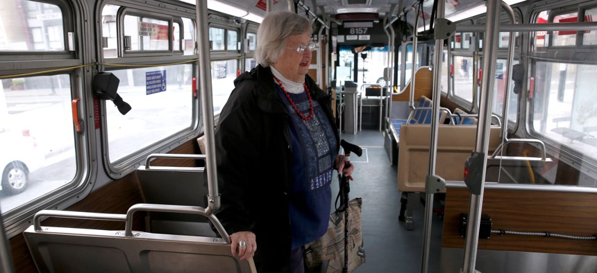 Jean Fowler takes a seat on the 43-Masonic Muni bus to the University of San Francisco.