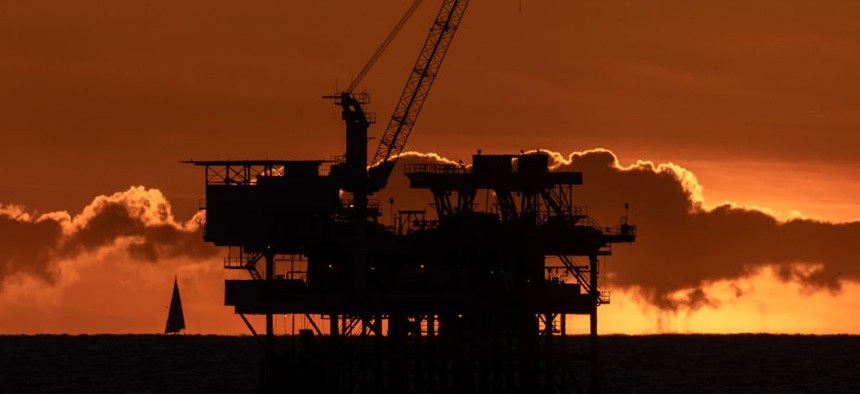  An offshore oil platform is seen at sunset on Feb. 9, 2024, near Huntington Beach, California. The gas and oil industry spent an all-time yearly record of $27,003,931 on lobbying in the state's capitol in 2023. 