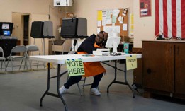 A poll worker sits at a desk at a polling location during the South Carolina Democratic Primary on Feb. 3, 2024, in Orangeburg, South Carolina. 