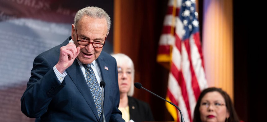  Senate Majority Leader Chuck Schumer, D-N.Y., with Sen. Patty Murray, D-Wash., and Sen. Tammy Duckworth, D-Ill., speaks during Senate Democrats' news conference in the Capitol on Tuesday, Feb. 27, 2024.