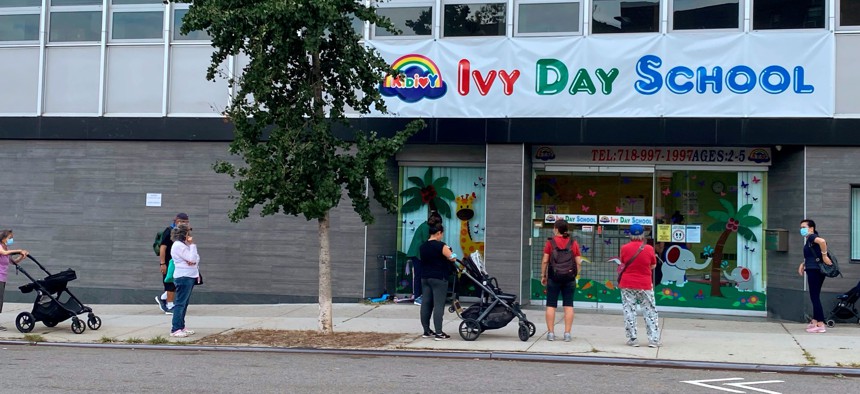 Parents waiting to pick up kids from Ivy Day School, Queens, New York. 